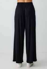 Pantaloni - black