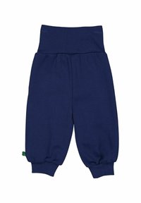 Námořnické modré dětské tepláky s žebrovaným pasem, elastickými manžetami a malou zelenou visačkou na spodní levé straně. Měkký bavlněný materiál.