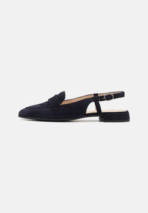 Navy suede slingback loafers with a low block heel, scalloped detailing on the toe, and an adjustable strap with a metal buckle.
