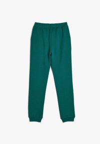 Grønne sweatpants med et struktureret, strækbart materiale, elastisk talje og smalle cuffs ved anklerne. Enkelt design uden yderligere detaljer.