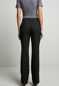 Next TAILORED  - Chinos tipa bikses - black