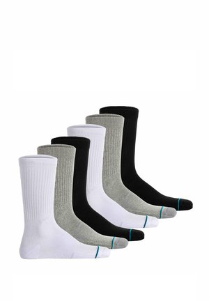 Set med sex par ankelsockor i svart, vitt och grått. Tillverkade av en bomullsblandning, med ribbad textur och kontrasterande tånaglar i teal.