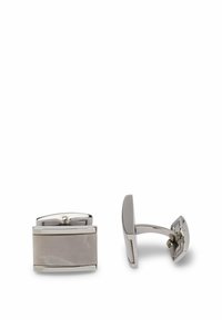 Silverfärgade metallknappar med rektangulär design och ljusa, släta insatser. Har en gångjärnsstängning för säker användning.