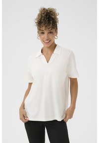 Witte katoenen polo met een v-hals, korte mouwen en een relaxte pasvorm, met een gladde textuur en zonder zichtbare patronen of accenten.