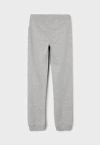 Graue Sweatpants aus weichem Baumwollstoff. Sie verfügen über einen dehnbaren Bund und schmal zulaufende Beine mit Bündchen an den Knöcheln. Einfaches Design ohne Muster.