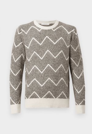 Gray and white zigzag-patterned sweater with a crew neck and ribbed cuffs and hem. Made from a textured knit material.