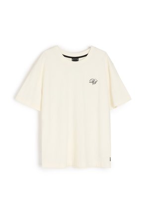 Kremowy bawełniany t-shirt z okrągłym dekoltem i krótkimi rękawami. Posiada czarne logo na lewej piersi oraz standardowy krój.