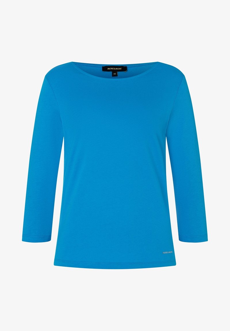 Blue long-sleeve shirt made of cotton. Features a round neckline and simple design. Label visible on the inside near the neck.