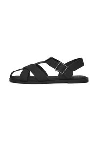 Schwarze Sandalen mit breiten, gekreuzten Riemen und Schnallenverschluss. Flache Sohle, minimalistisches Design und glatte Textur. Geeignet für die Freizeit.