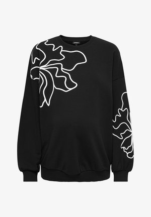 Črna kapuca z velikanskimi belimi cvetličnimi konturami, rebrastimi manšetami in robom. Narejena iz mehke, elastične tkanine za udobje.