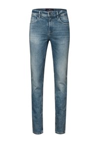 Jeans de mezclilla azul claro con un corte slim, que presentan un diseño clásico de cinco bolsillos, un sutil desgaste y un corte recto.