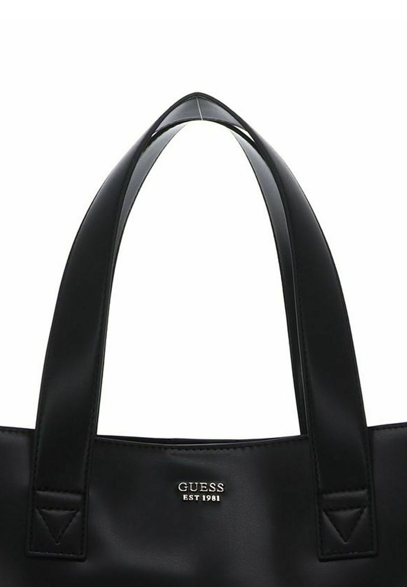 Borsa nera in materiale sintetico liscio, con doppio manico e logo del brand in rilievo. Presenta un design strutturato e un'estetica minimalista.