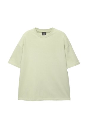 Világoszöld, laza szabású póló puha pamutból. Széles kerek nyakkivágással és rövid ujjakkal rendelkezik, alján egyenes szegéllyel.