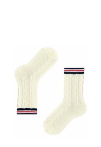 Cremefarbene Socken mit Kabelstrickmuster; mit einem navy- und weiß gestreiften Bündchen, das rote Akzente aufweist.