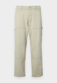 Beige cargo pants made of cotton with multiple pockets, reinforced knees, and straight legs. Features a button closure and belt loops.