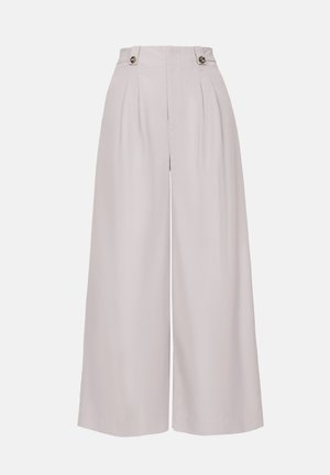 Pleated wide-leg trousers in light beige fabric with a smooth texture, featuring two buttons at the high waistband.