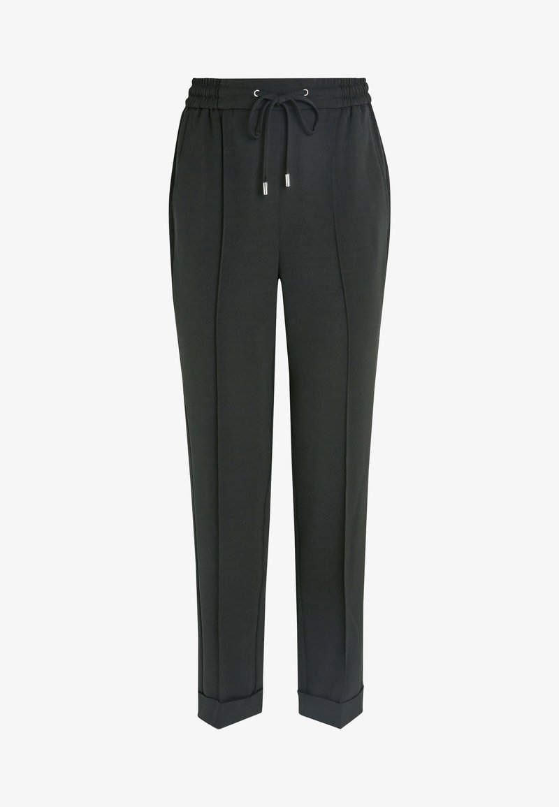 Joggers ajustados de color negro, con cintura elástica, cordón ajustable y dos pliegues frontales; los puños presentan un diseño entallado.