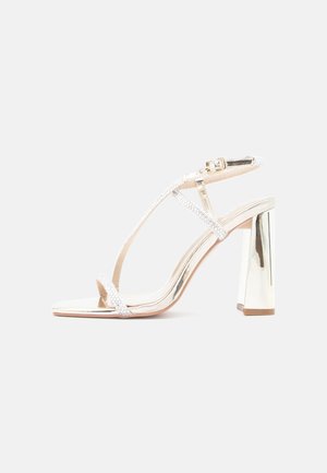 Simmi London LUCIA - Magas sarkú szandálok - gold-coloured