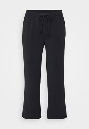 Černé joggingové kalhoty vyrobené z měkkého materiálu, s elastickým pasem na stahovací šňůrku, bočními kapsami a rovnými nohavicemi.