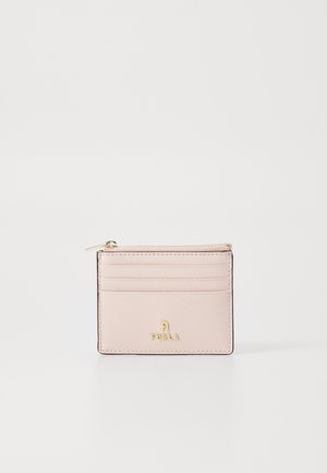 Furla cardholder in soft pink textured leather with gold hardware. Features multiple card slots and a zippered pocket, rectangular shape.