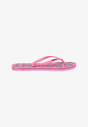 Roze flip-flop met grijs "SUPERDRY" logo, van rubbermateriaal, platte zool en dunne banden. Heeft een gestructureerde voetbed en contrasterende zwarte rand.