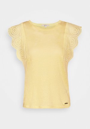 Haut jaune à manches courtes avec détails festonnés en œillets sur les épaules et une texture douce. Encolure ronde simple et ourlet droit.