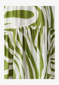 Odabrano, olive brush stroke