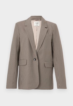 Single-breasted brown and beige houndstooth blazer with notch lapels, two front flap pockets, and one button closure.