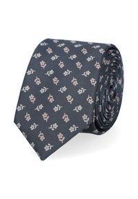 Granatowy krawat o ryflowanej teksturze, z powtarzającym się kwiatowym wzorem w jasnoróżowym i szarym kolorze. Zwinięty i eksponujący swój spiczasty koniec.