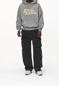 Pegador Jersey con capucha - grey