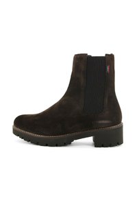 Stivali Chelsea in suede marrone scuro con pannello elastico nero sui lati e suola in gomma spessa con tacco basso.