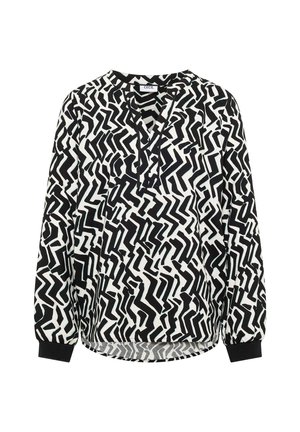 Svart och vit långärmad blus med abstrakt zigzag-mönster, V-ringning och ribbade manschetter. Mjuk tyg med avslappnad passform.