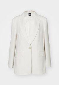 Blazer bianco con rever a punta, chiusura a un bottone, due tasche frontali e tessuto liscio con una silhouette strutturata.