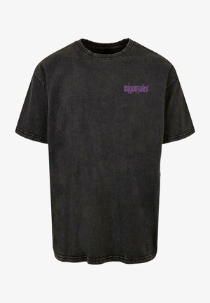 Black cotton t-shirt with a relaxed fit, short sleeves, and purple graphic text on the chest. Features a crew neckline and faded texture.