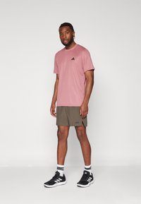 adidas Performance Sports shorts - shadow olive