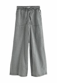 Pantalons larges avec une ceinture élastique, présentant un motif à carreaux vichy noir et blanc et deux grandes poches avant.