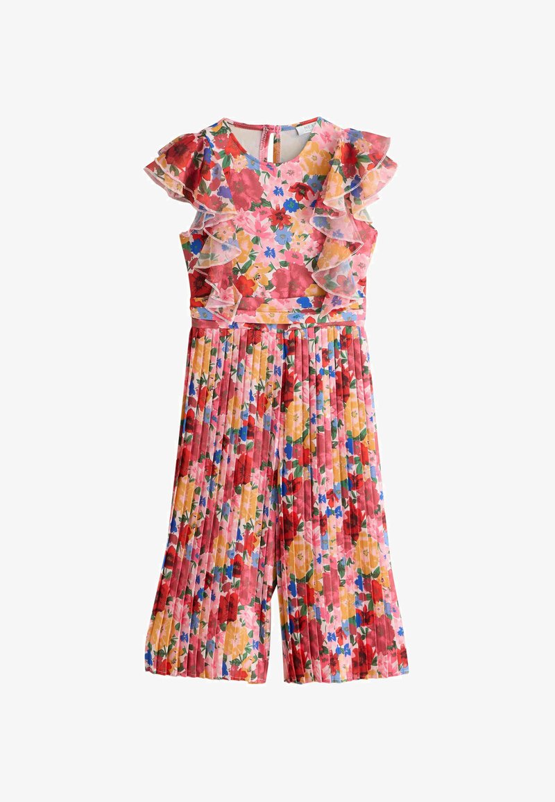 Virágmintás overall, rózsaszín alapon piros, sárga és kék mintákkal, fodros ujjakkal, pliszírozott nadrággal és hátul cipzárral záródik.