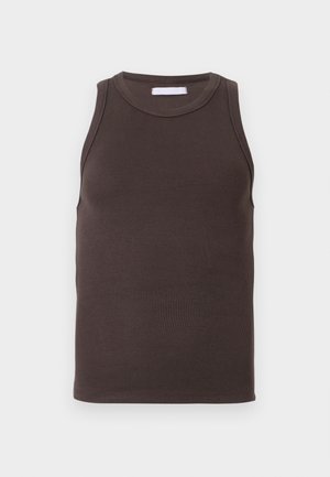 Brasls krūšturis ar ribotām maliņām, apaļu kakla izgriezumu un bez piedurknēm. Audums ir elastīgs ar gludu tekstūru. Vienkāršs, minimālistisks stils.