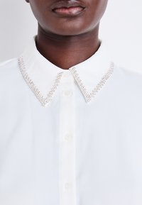 ONLY ONLVINEA LIFE SHIRT - Blúzka so zapínaním na gombíky - creme