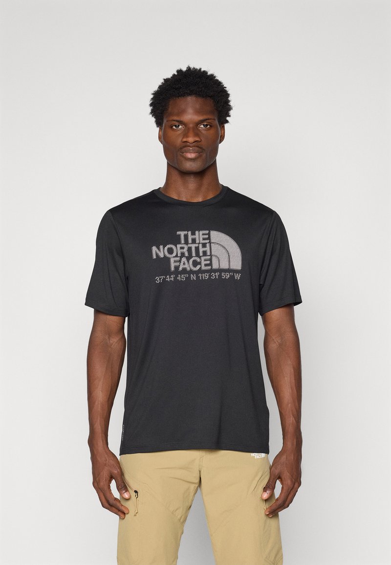 T-shirt noir à manches courtes arborant le logo "The North Face" en gris clair, texture douce, col rond et coupe décontractée.