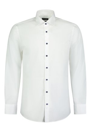 Camicia bianca a maniche lunghe con colletto button-down, dotata di bottoni navy lungo il davanti e i polsini. Tessuto liscio, design su misura.