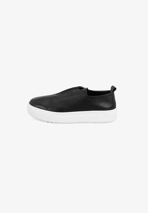Black leather slip-on sneakers with textured surface, white rubber sole, smooth rounded toe, and pull tab at the heel.