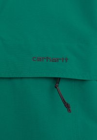 Carhartt WIP Jachetă de vânt - chervil/black