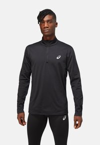 ASICS - CORE LS 1/2 ZIP WINTER TOP - T-shirt till träning - performance black Miniatyrbild 1