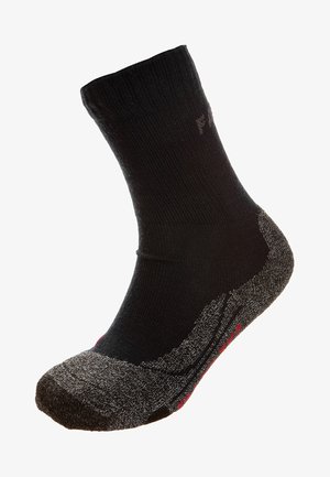 Chaussette noire avec une texture côtelée et un talon et un orteil renforcés gris. Présente des accents rouges et un logo sur le dessus. Longueur mi-mollet.