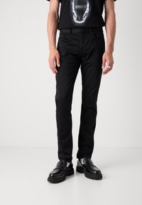 HUGO 734 Pantalones black/negro