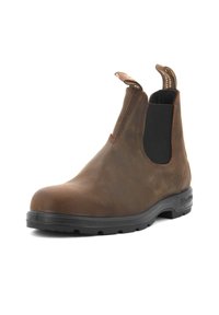 Stivale alla caviglia in pelle marrone con pannelli laterali elasticizzati e linguette di sollevamento. Presenta una robusta suola in gomma e un design della punta rotonda.