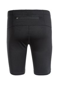 Sorte sportsbukser lavet af strækbart stof, med en lynlåslomme bagpå og glatte sømme.