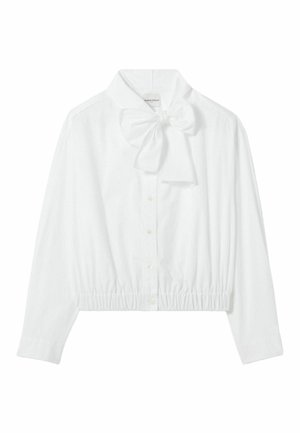 Blusa blanca corta con lazo en el cuello, cierre de botones y dobladillo fruncido. Hecha de una tela lisa y ligera.