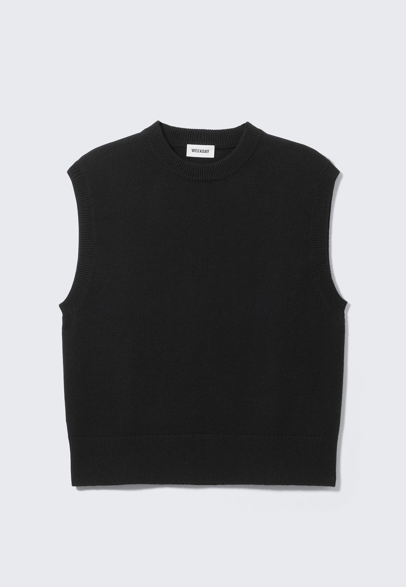 Μαύρο πλεκτό αμάνικο πουλόβερ από μαλακό ύφασμα. Ριμπ λαιμόκοψη και τελείωμα. Απλός σχεδιασμός χωρίς επιπλέον σχέδια ή διακοσμήσεις.
